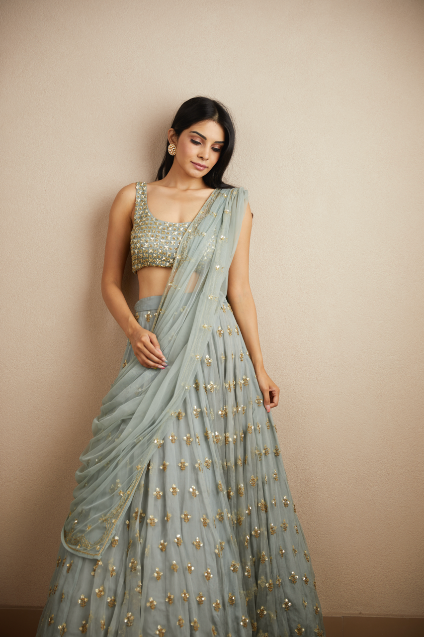 POWDER BLUE WITH GOLD BOOTIE WORK LEHENGA SET Astha Narang