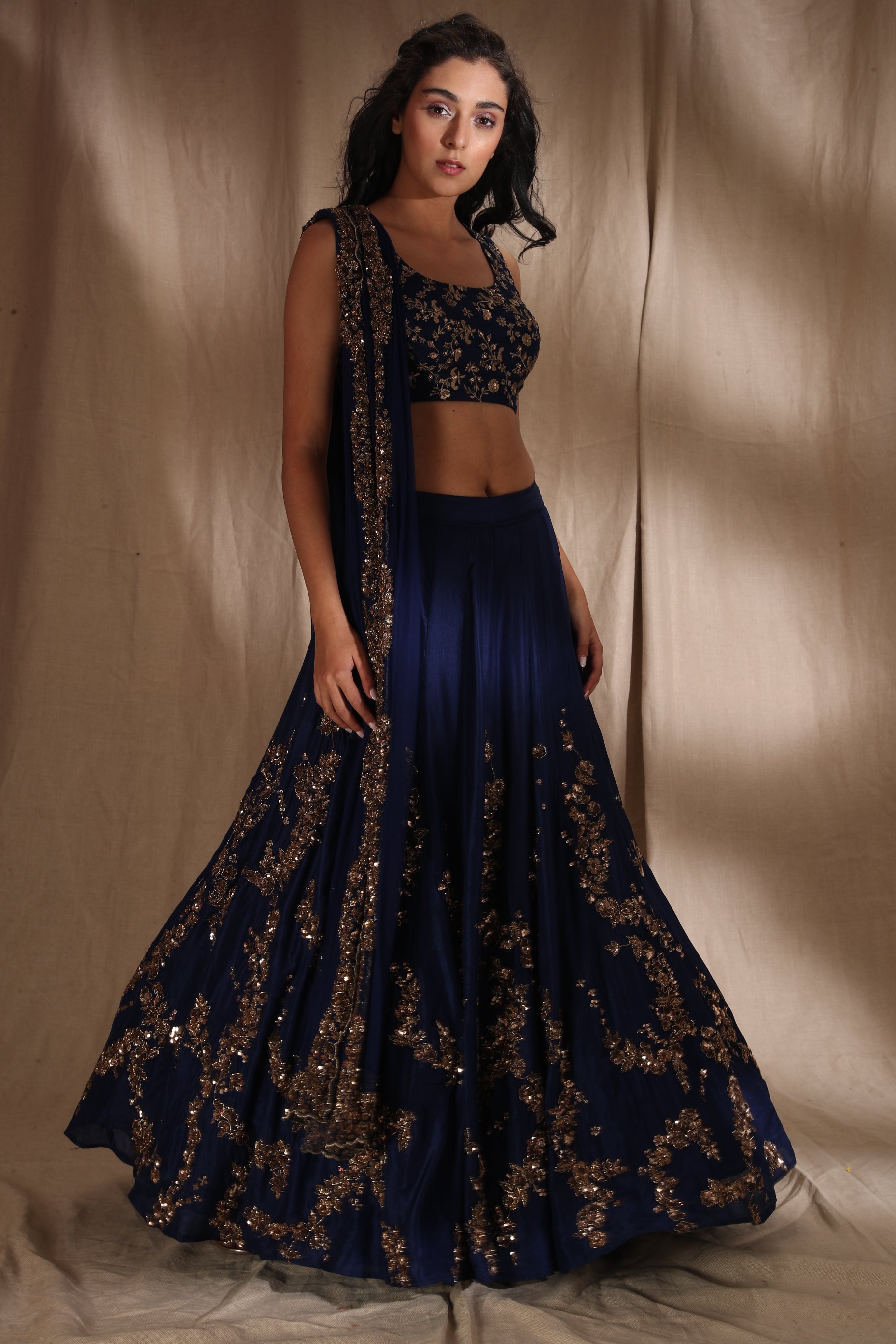 Navy blue Lehenga with blue bead work blouse and rose gold glass beads  embroidery on skirt | Traditional dresses, Indian designer outfits, Floral  lehenga